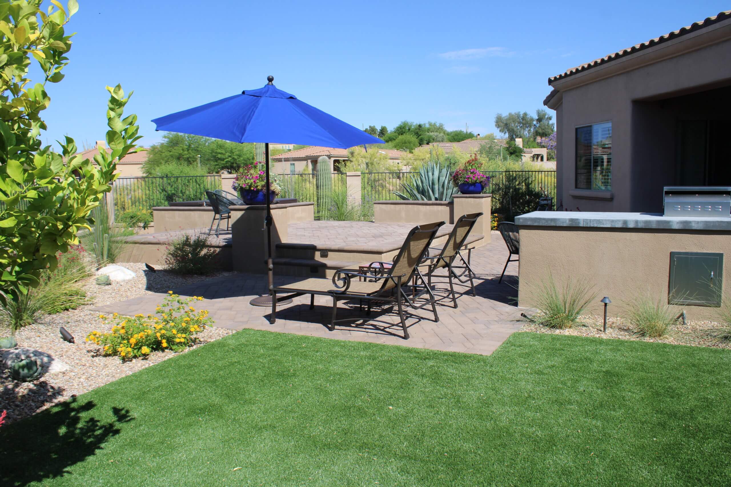 A patio in a Southern Arizona backyard with expert landscape design